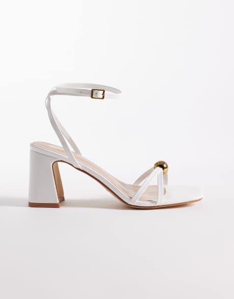 RAID Wide Fit Devena block heeled sandals in gold detail in white - view 1