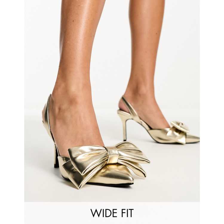 Shiny best sale gold heels