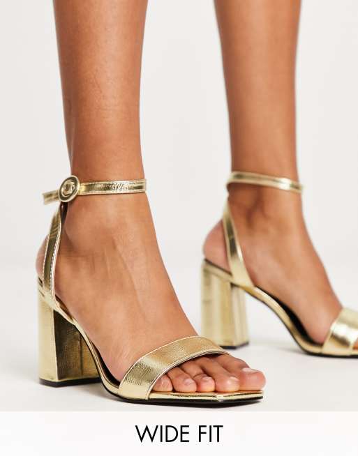 RAID Wide Fit - Wink - Sandali con tacco largo color oro a pianta larga