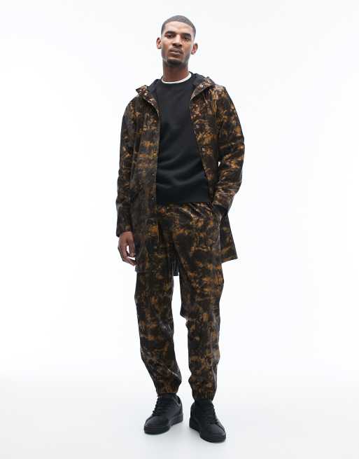 Rains - 12020 - Uniseks lang waterbestendig jack met capuchon en abstracte modderige print, 2 van 5