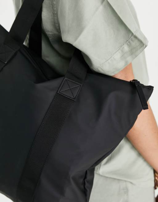 Rains - 12250 - Rush - Uniseks waterbestendige tote tas in zwart, 4 van 4