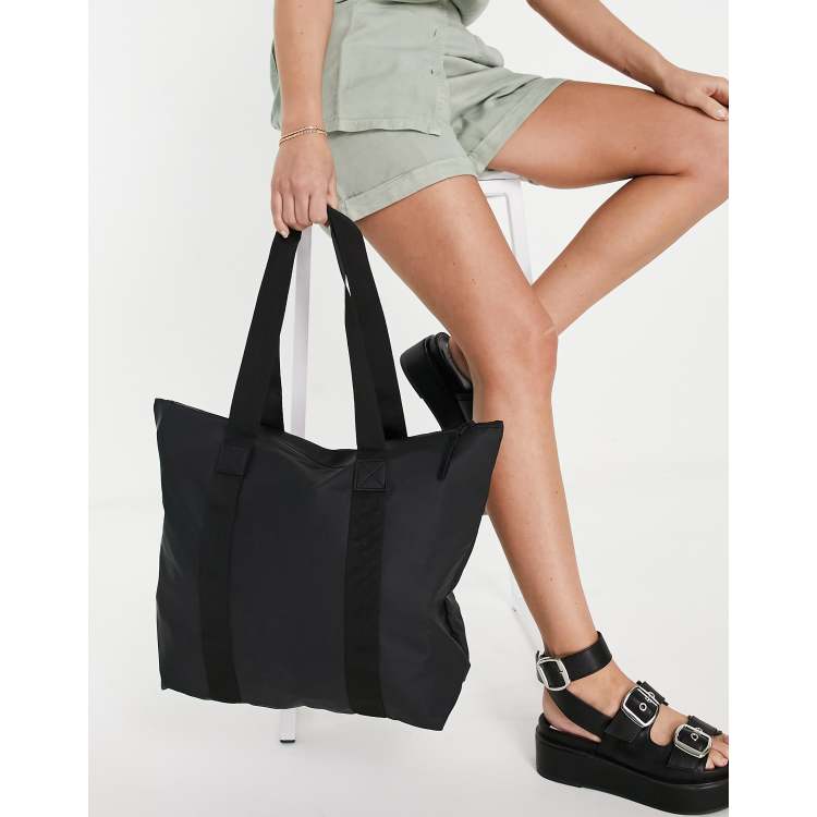 Rains 12250 unisex waterproof Rush tote bag in black ASOS