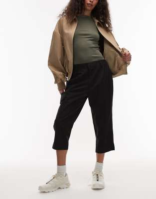 Rains - 12530 Suva - Pantacourt slim imperméable - Noir