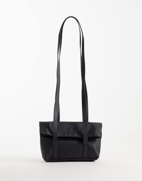 Rains 12860 vandtæt crossbody-/skuldertaske med to bæremåder i sort - view 1