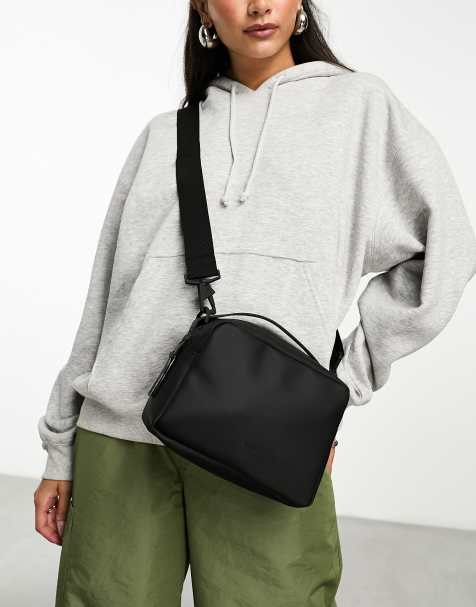 ASOS DESIGN multi pouch cross body bag in black nylon