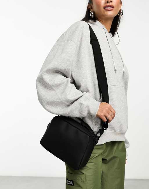 ASOS DESIGN utility crossbody bag with pockets in black