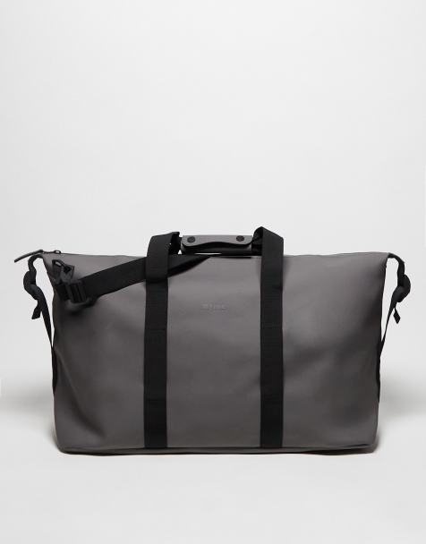 Rains – 14200 – Wasserfeste Unisex-Reisetasche in Grau - view 1
