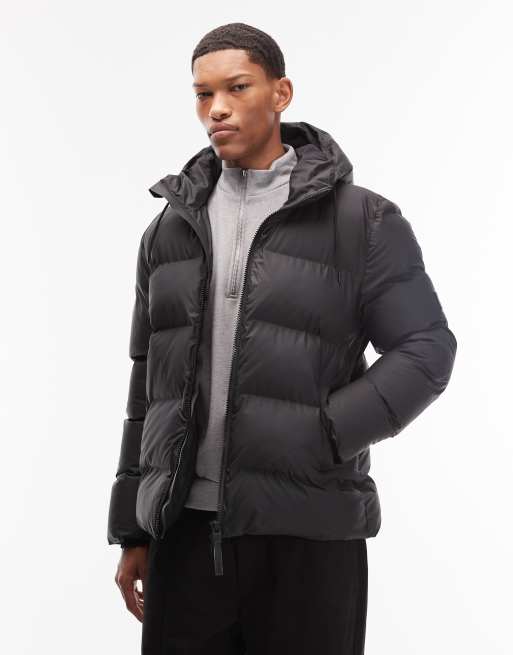 Rains - 15120 Alta - Piumino taglio corto impermeabile verde con stampa sfocata