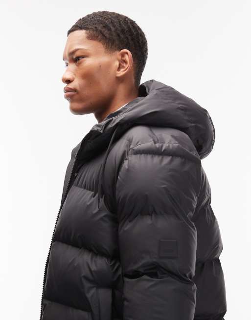 Rains 15120 Alta waterproof short puffer jacket in green blur print, 4 of 5