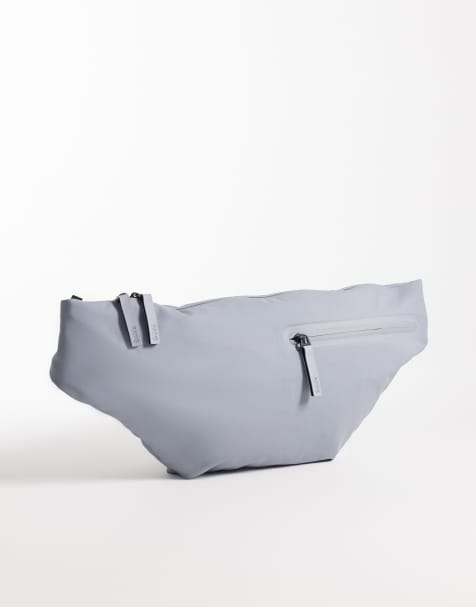 Rains – 16270 Dash – Wasserfeste Gürteltasche in Hellblau - view 1