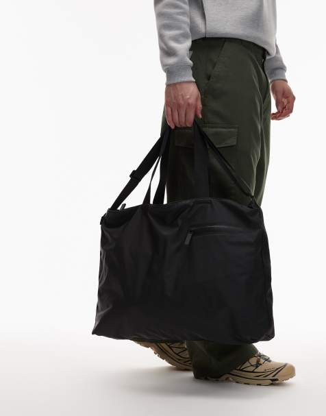 Rains – 16430 Dash – Czarna wodoodporna torba listonoszka typu tote - view 1