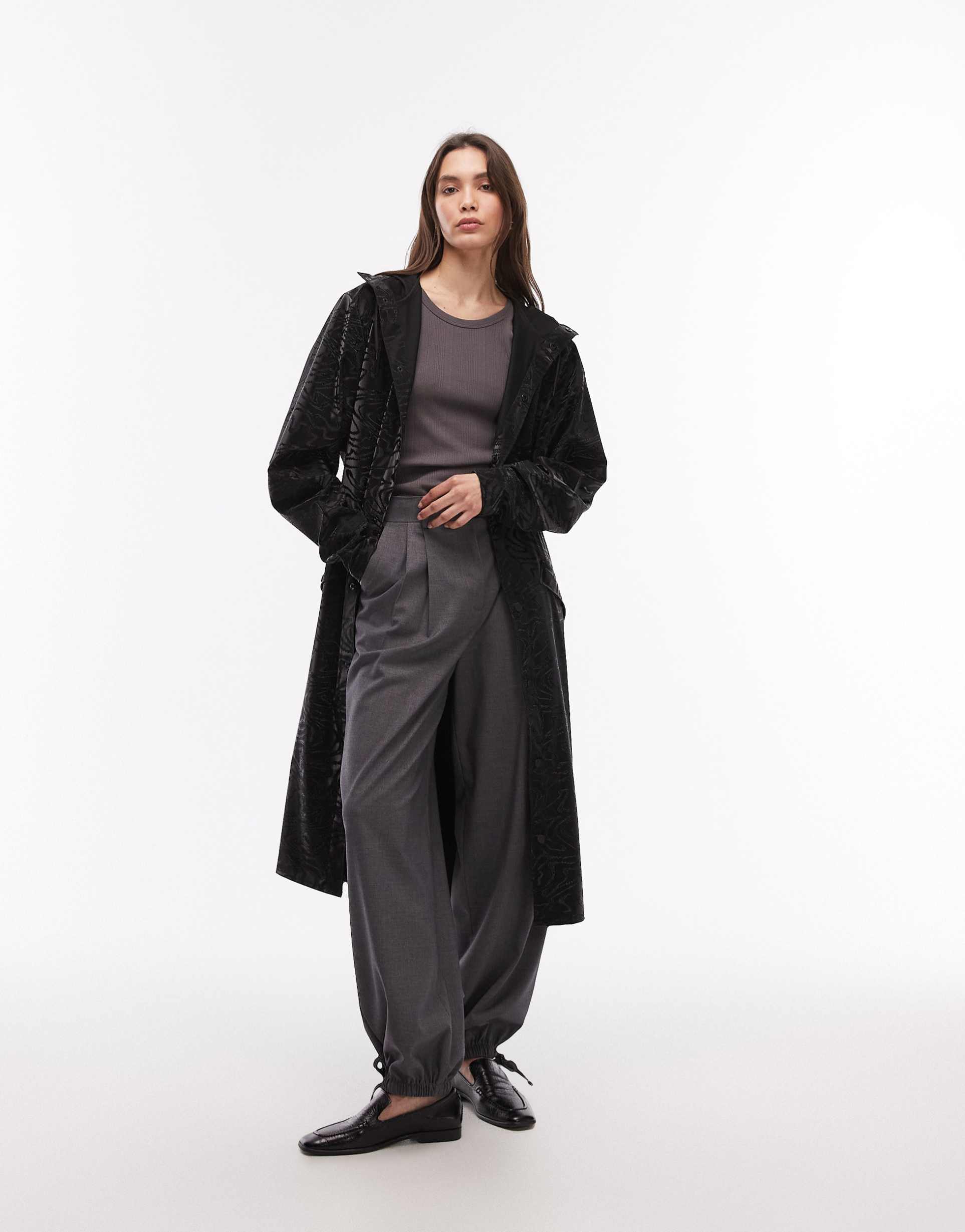 rains 18360 waterproof printed longer jacket in black