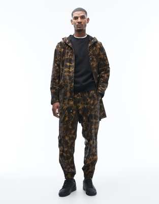 Rains Rains 18560 waterproof drawstring trousers in abstract muddy print-Brown