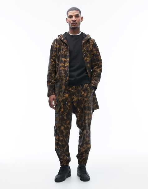 Rains 18560 waterproof regular fit drawstring pants in muddy print brown - view 1