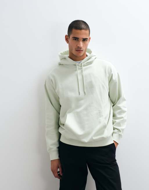 Rains – 41170 – Relaxed-Fit-Kapuzenpullover in Blassgrün mit Logo im Farbspritzer-Design und Rückenprint, 2 von 5