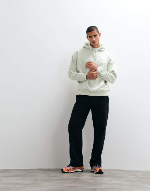 Rains – 41170 – Relaxed-Fit-Kapuzenpullover in Blassgrün mit Logo im Farbspritzer-Design und Rückenprint, 3 von 5