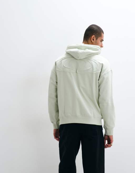 Rains – 41170 – Relaxed-Fit-Kapuzenpullover in Blassgrün mit Logo im Farbspritzer-Design und Rückenprint, 5 von 5