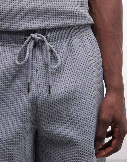 Rains 41390 loose fit waffle drawstring logo shorts in blue (part of a set), 4 of 5