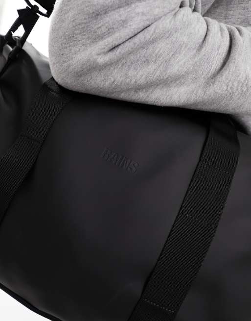Rains Hilo small weekend bag in black | ASOS