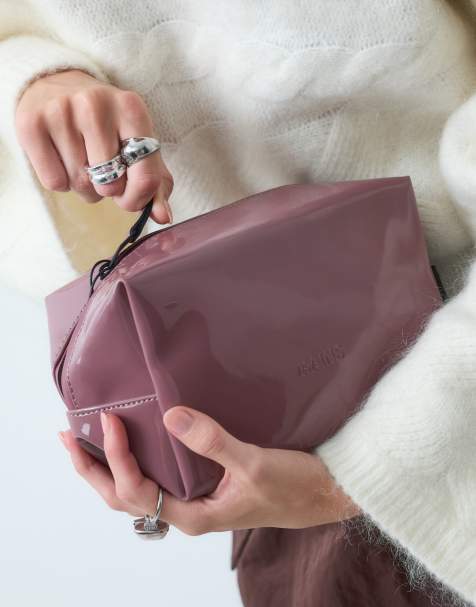 RAINS kleine wasserdichte Kulturtasche in Mauve - view 1
