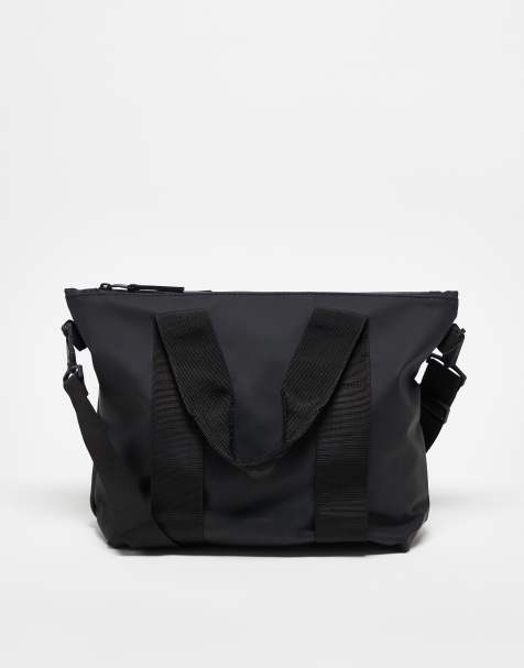 Rains micro unisex waterproof tote with crossbody strap in black - view 1