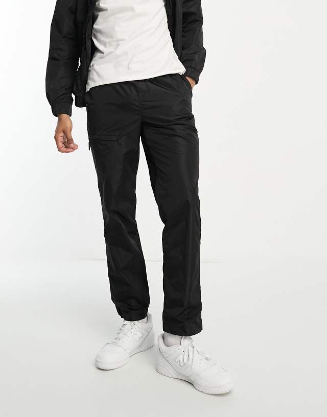 Rains - nylon trousers in black