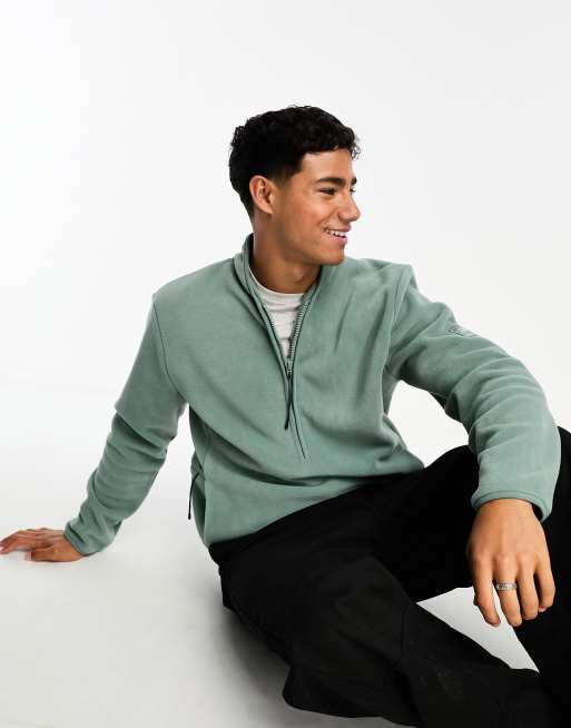 Rains - Pile verde chiaro con zip corta