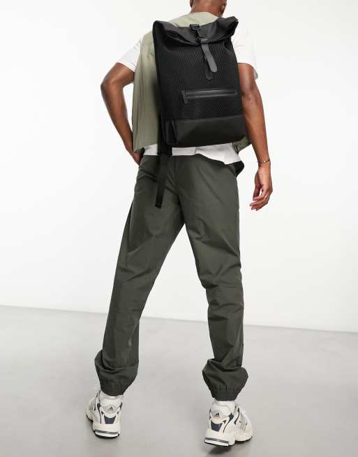 Rains rolltop mesh rucksack in black