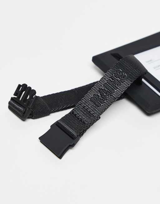 Rains Texel travel tag in black | ASOS