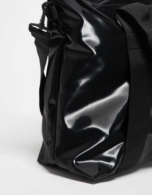 Rains Tote mini unisex waterproof tote with crossbody strap in shiny black, 4 of 4