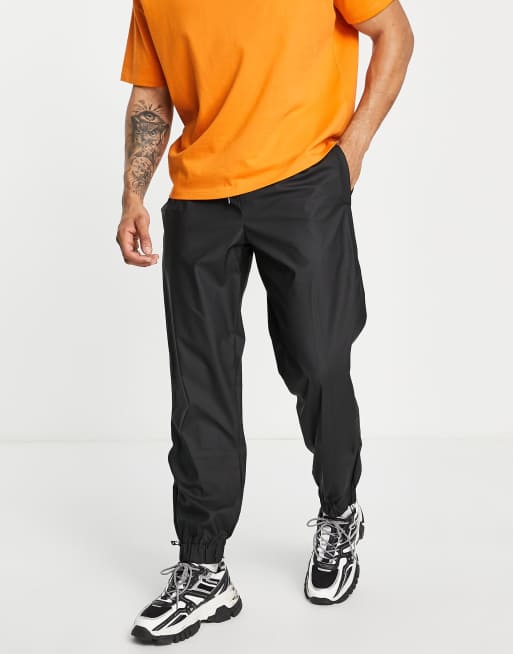 Rains trousers in black 
