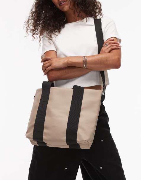 Rains waterproof micro tote bag in beige - view 1