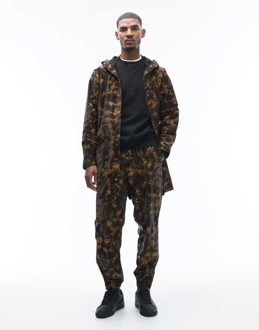 Rains waterproof regular fit drawstring pants in muddy print brown