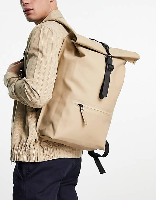 Rains waterproof rolltop rucksack in beige | ASOS