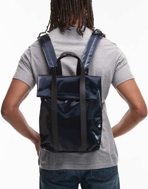 Rains waterproof small tote backpack in metallic navy - view 1
