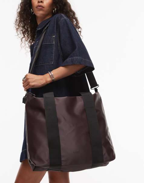 Rains waterproof small tote bag in dark brown - view 1