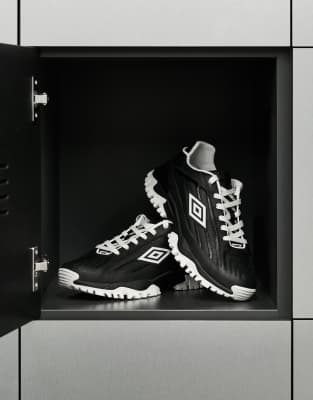 Rains Rains X Umbro logo trainers in black with white detailing