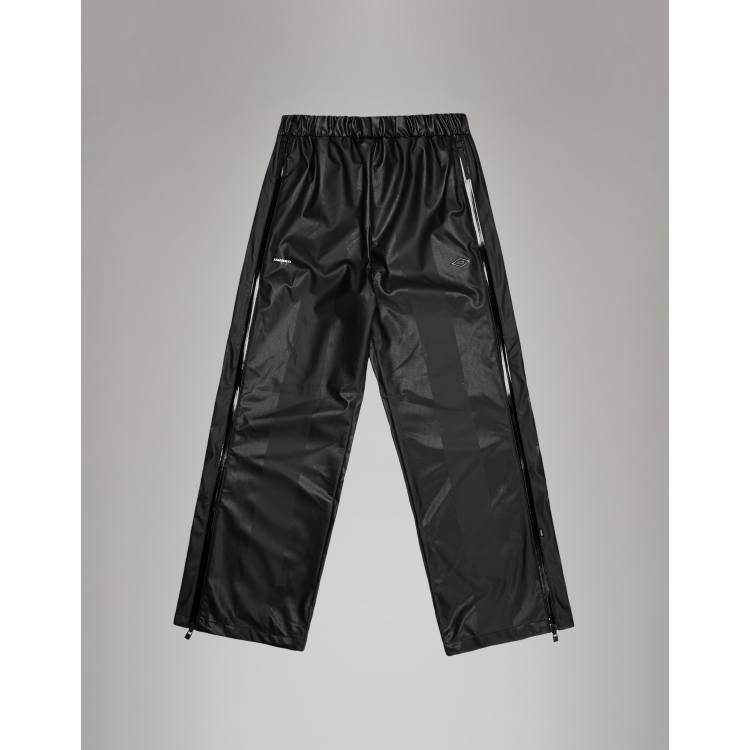 Rains X Umbro waterproof relaxed zip track pants in black | ASOS