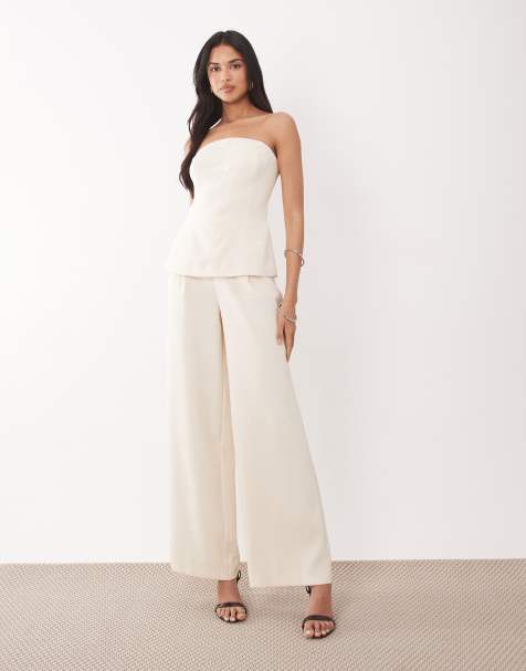 Rare London - Getailleerde bandeau-jumpsuit met peplumdetail en wijde pijpen in crème - view 1