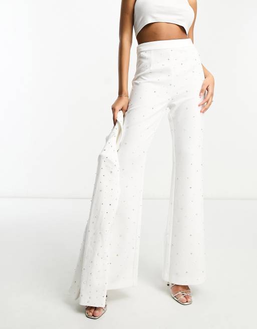 Rare London - Pantaloni a zampa bianchi decorati con strass in coordinato