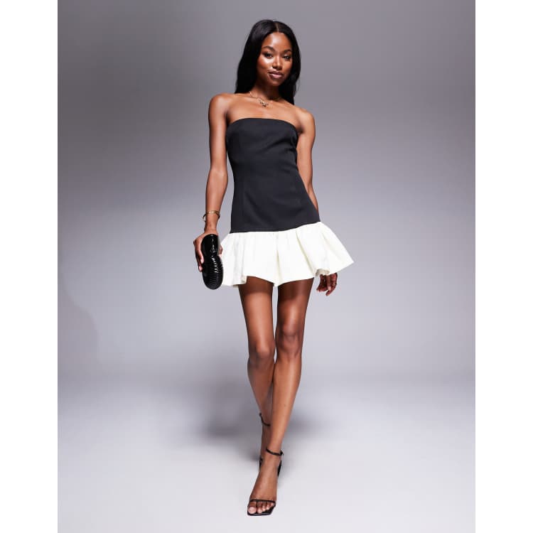 Rare London satin bandeau contrast ruffle bottom mini dress in black & white  | ASOS
