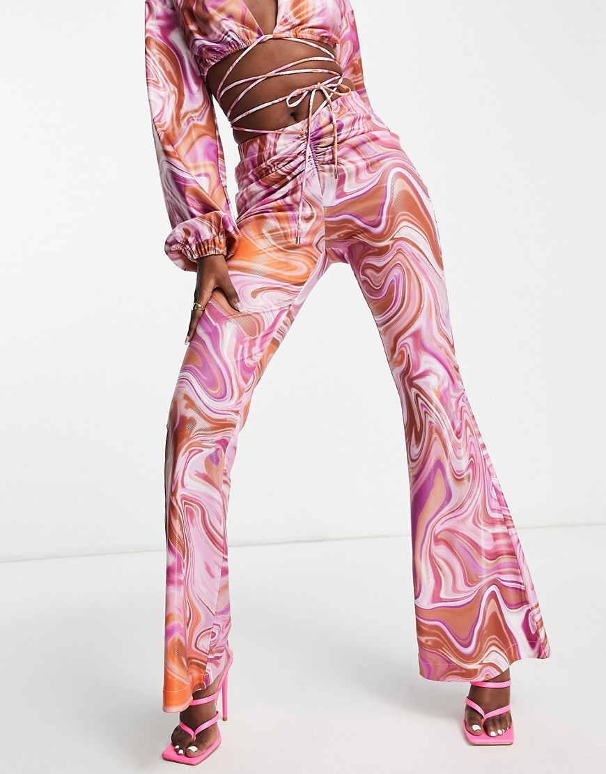 London satin flared pants in pink swirl print - part of a set