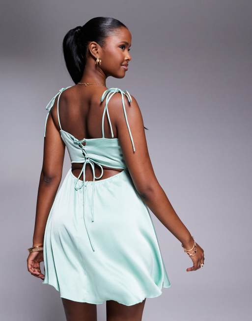 ruched bust mini dress in mint Rare London satin ruched bust tie back floaty mini dress in turquoise