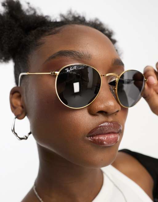 Ray Ban round polarised sunglasses in black and gold ASOS