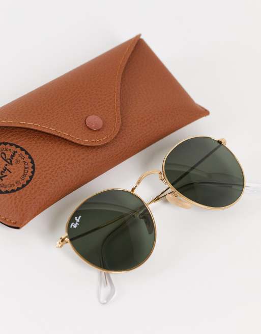 Ray Ban round sunglasses in gold ASOS