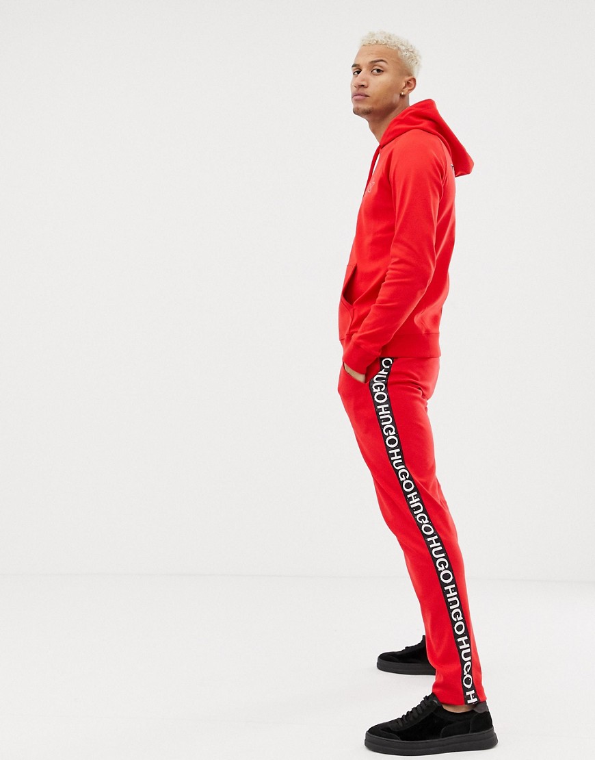 Røde Dusten-joggingbukser med logostribe ned ad benet fra HUGO