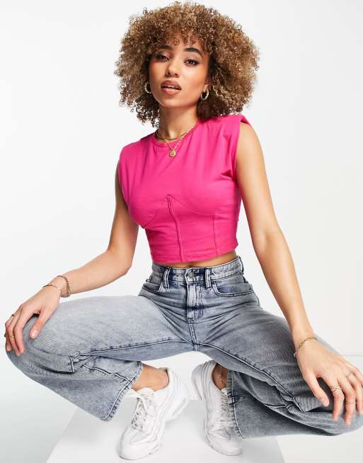 Rebellious Fashion front seam shoulder pad crop top in pink ASOS