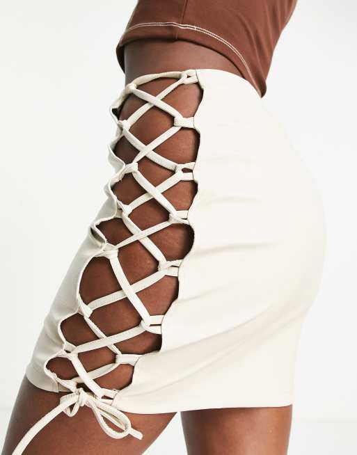 Rebellious Fashion - Minirok in leerlook met strikdetail in ecru, deel van co-ord set