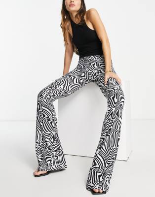 rebellious fashion - pantaloni a zampa con stampa astratta-multicolore