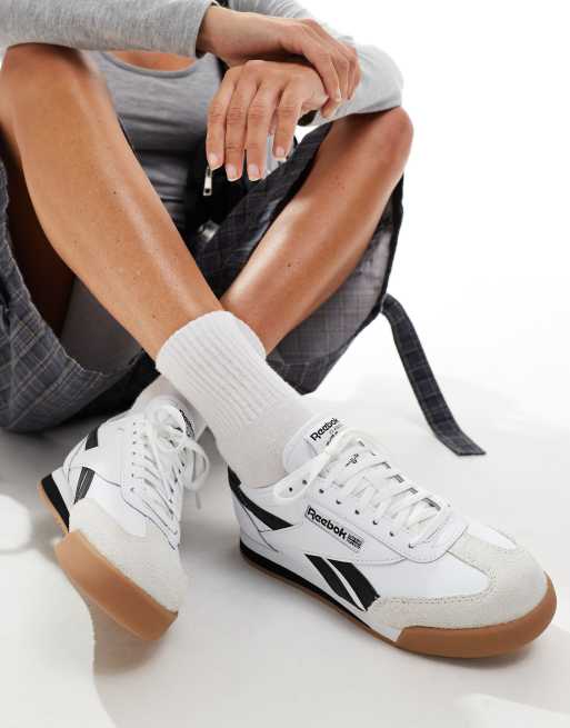 Rebook Campio XT trainers in white and black